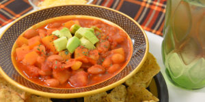 butternut squash posole plated with tortilla chips on the side