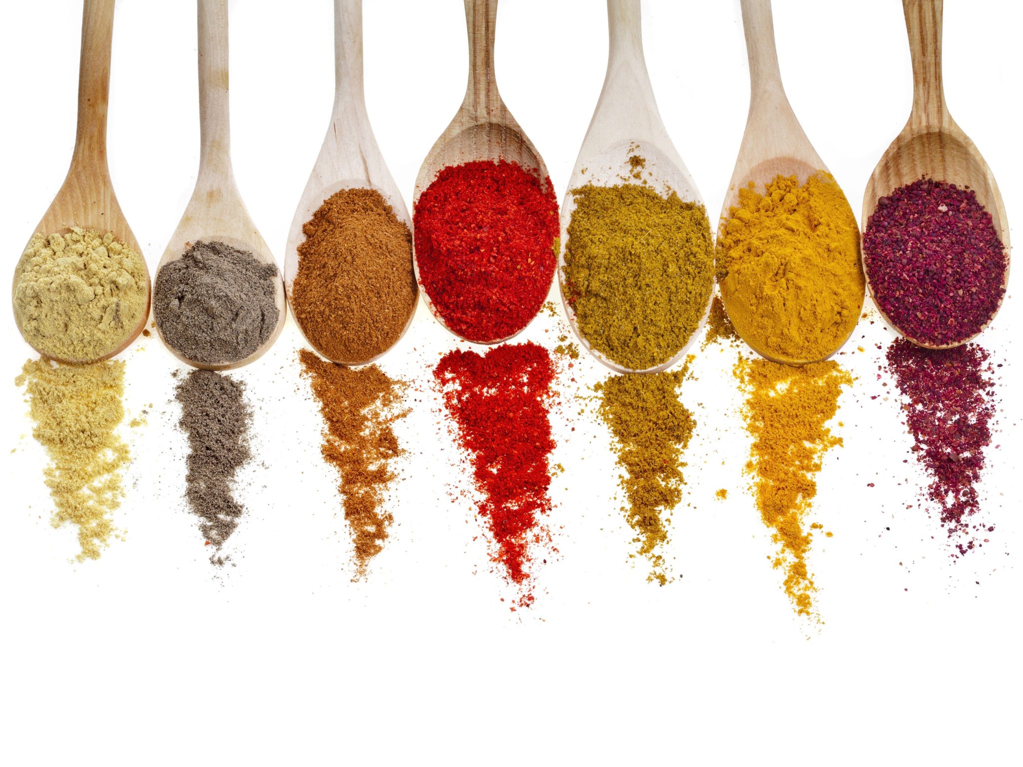 Various spices in spoons